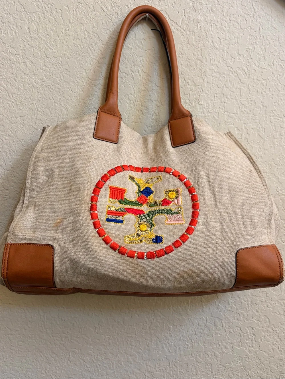 Tory Burch Beige Canvas Tote with Brown Leather Trim and Embroidered Medallion
